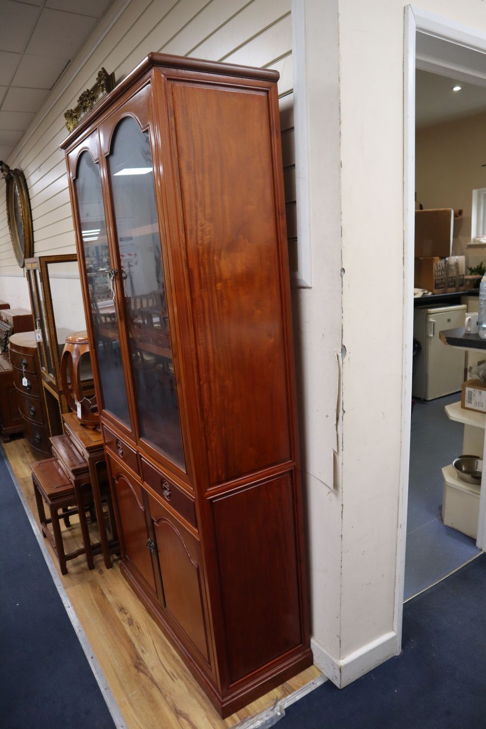 A Chinese hardwood cabinet, width 92cm, depth 35cm, height 183cm